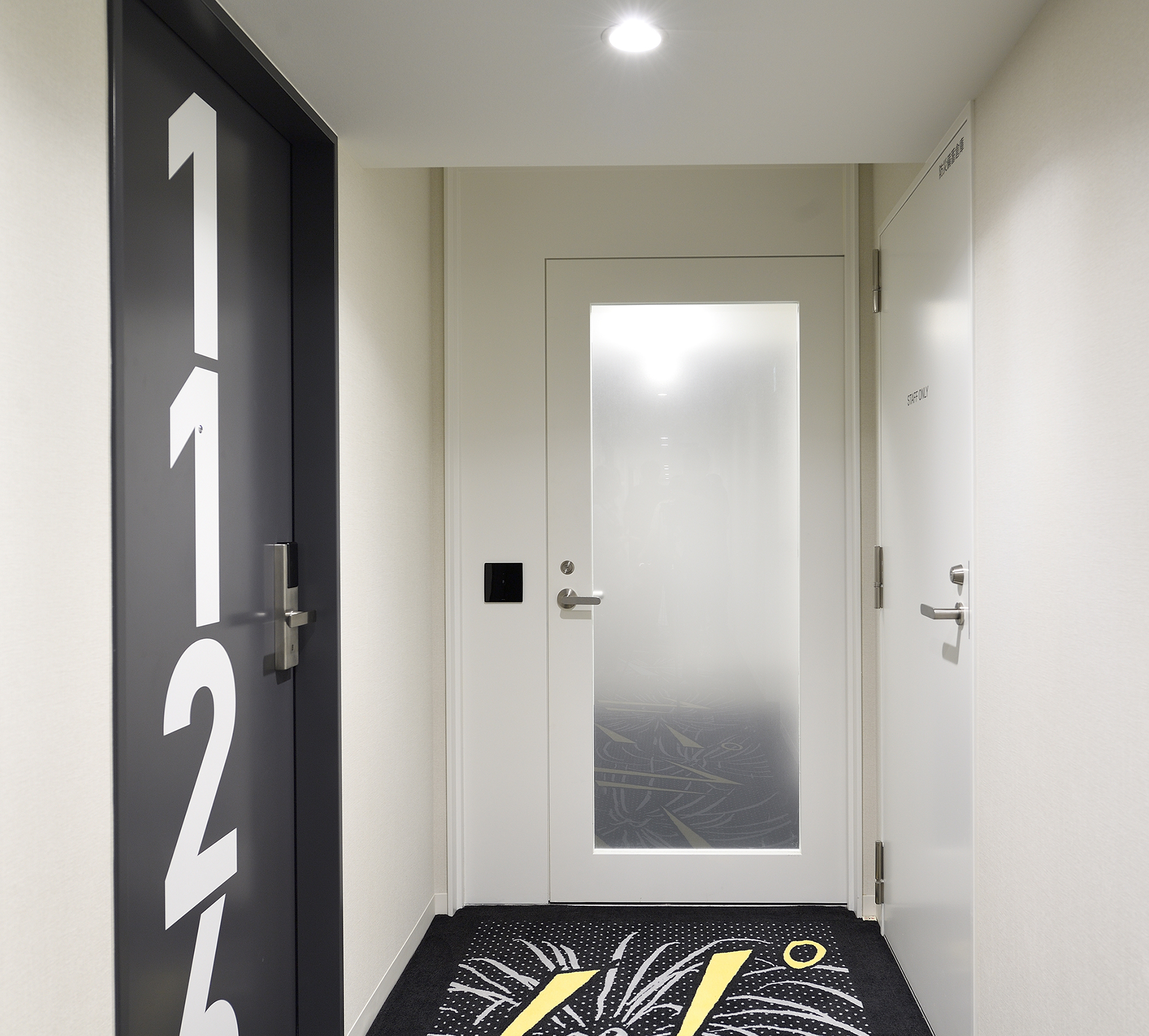 This is the entrance to the Adjoining Room. The area beyond the door is exclusively for the use of hotel guests and fully secured.