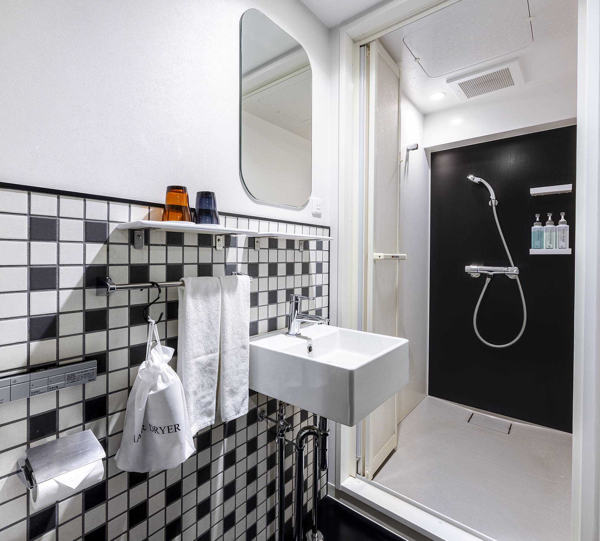 The room has a shower booth only. Shampoo, conditioner, and body soap are provided for use.