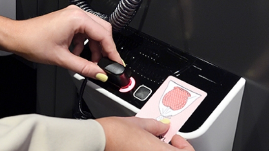 3.Press the black rectangular button. Touch your IC card to the spot that lights up.